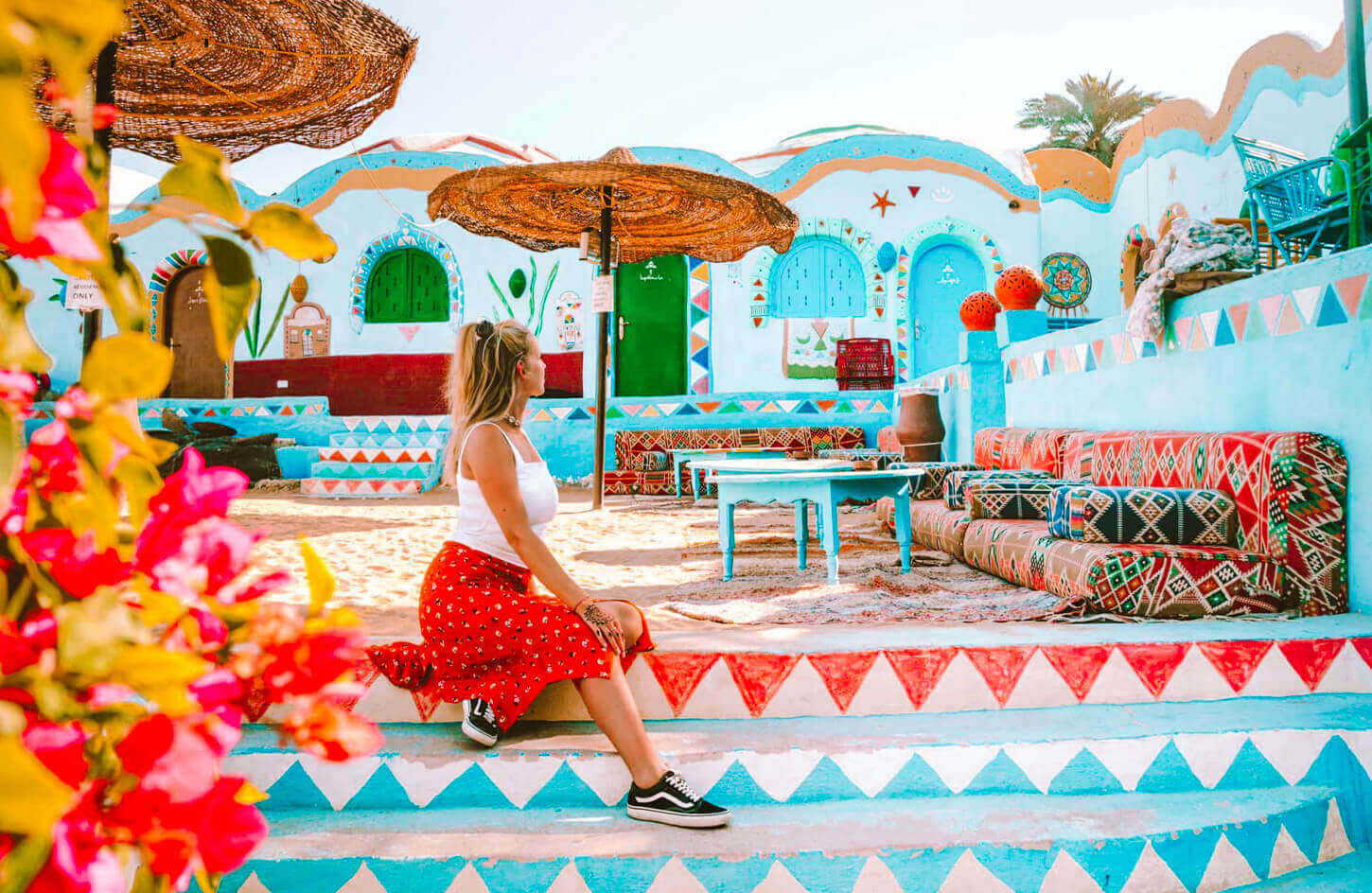 A-tourist-enjoys-sitting-in-the-Nubian-village