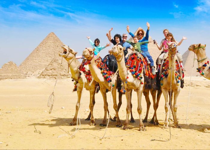 A-wonderful-photo-of-a-family-inside-the-pyramids-and-riding-camels